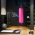 Moxy Milton Keynes fitness room with pink punching bag, bench, dumbbells and exercise mat