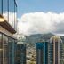Bishop Suites at The Executive Centre, Honolulu, with mountain and city skyline view from balcony