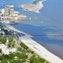 Hampton Inn Biloxi with aerial view of Biloxi beach, coastline, and waterfront hotels