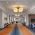 Hyatt House Emeryville/San Francisco Bay Area lobby with orange-and-blue runner and seating area