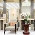 Hengshan Garden Hotel Shanghai lounge with two armchairs and a flower arrangement