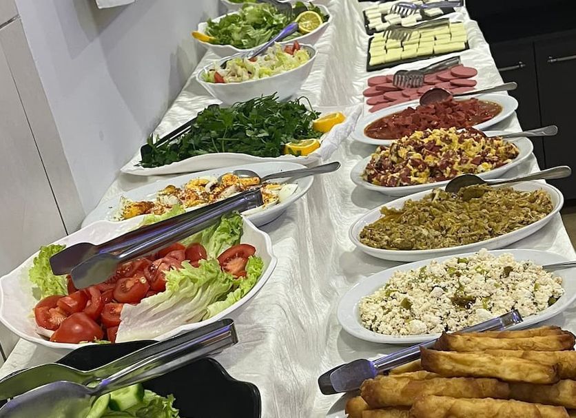 Balkan Palace Edirne buffet table with salads, cheeses, sliced meats and fried pastries