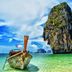 Seashell Resort Krabi, Krabi: longtail boats on turquoise water with dramatic limestone cliffs