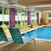 Home2 Suites by Hilton Arundel Mills BWI Airport indoor pool in Hanover with lounge chairs