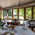 Evergreen Manor and Spa in Stellenbosch dining room with garden views through arched windows