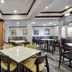 Fairfield Inn & Suites by Marriott San Antonio Boerne breakfast area with tables, chairs, and bar seating