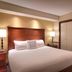 Fairfield Inn & Suites by Marriott Boise Nampa guest room with king bed and sitting area in Nampa