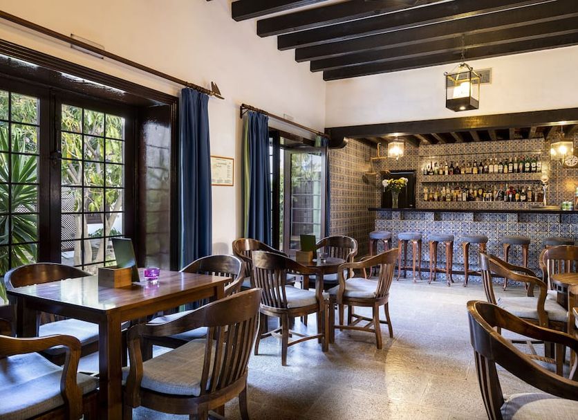 Parador de La Gomera bar and lounge in San Sebastián de la Gomera with wooden tables and tall stools