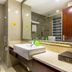 Hangzhou Sailing International Hotel bathroom with walk-in shower, toilet, vessel sink and large mirror in Hangzhou