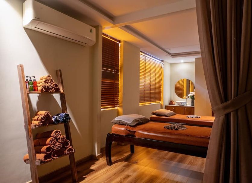 Alagon D'Antique Hotel & Spa spa treatment room with massage beds in Ho Chi Minh City