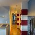 Hotel Villa Klemm - Wiesbaden City hallway with kitchenette and ocean-view mural