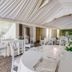 Europa Stabia Hotel in Castellammare di Stabia, elegant event space with white-draped ceiling and round tables