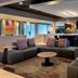 Courtyard by Marriott Chicago Waukegan/Gurnee lounge seating and bar area in Waukegan