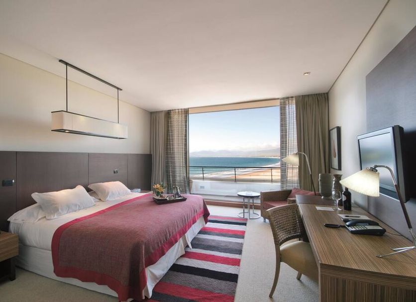 Enjoy Coquimbo hotel room with king bed and ocean view balcony in Coquimbo