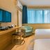 Super 8 by Wyndham Beijing Xi Zhi Men guest room with twin beds, desk, and city-view window