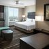Homewood Suites by Hilton Aliso Viejo - Laguna Beach room with bed, sofa, TV and city view