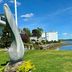 Fort Knox Inn in Bucksport with waterfront lawn, sculptural monument, and river views