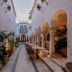 Donatella Boutique Hotel Miami Beach courtyard with arches, columns, plants and outdoor seating
