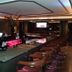 New Hope Inn & Suites bar area in New Hope with high stools and pink-lit counter