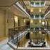 Movich Casa del Alferez in Cali, atrium lobby with ornate iron balcony railings and indoor plants