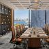 The Ritz-Carlton, Perth meeting room with long conference table and city skyline view