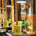 Nyx Hotel Munich By Leonardo Hotels dining area in Munich with birch tree decor and lime-green menus