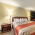 Motel 6 Gatlinburg Smoky Mountains room with king bed and in-room spa tub in Gatlinburg