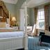 Best Western Sysonby Knoll Hotel in Melton Mowbray: four-poster bed in a classic guest room with sitting area