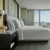 Four Seasons Hotel One Dalton Street, Boston guest room with floor-to-ceiling city views and dome skyline