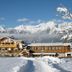 Hotel Geisler Tulfes in Tulfes with snowy alpine mountain views and a snow-covered lodge