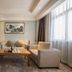 Yong Cun Hotel (Xi'an Bell Tower) in Xi'an, modern lounge seating with coffee table and large windows