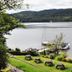 Beech Hill Hotel & Spa in Windermere with lake view, sailboats, and picnic tables on the lawn