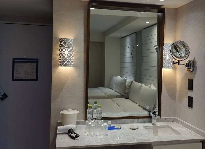 BelAir Business a Wyndham Garden Hotel Mexico City guest room vanity with mirror and twin beds