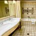 Great Greece Le Convivial Suites bathroom in Xylókastro with double vanity, bathtub and toilet