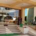 Seven Sky Clarks Exotica, Bhuj: hotel entrance with steps, glass doors, and covered entryway