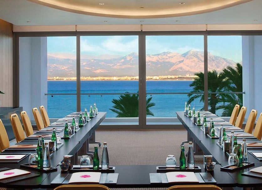 Akra V Hotel Antalya meeting room with floor-to-ceiling sea and mountain views