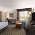 La Quinta Inn & Suites by Wyndham Bakersfield North room with king bed, desk, window seat and large window