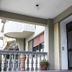 Hotel il Focolare in Fabro exterior entrance with balcony and potted plants