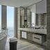 Rosewood Guangzhou bathroom with freestanding tub, floor-to-ceiling windows and city views in Guangzhou
