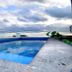 Rooftop pool at Illusion Xpress I Attraction Hotel Deluxe in Playa del Carmen with ocean views