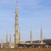 Dar Al-Naeem Hotel in Medina with view of the Prophet's Mosque minarets and courtyard