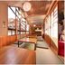 Nikko Yumoto Onsen Honokana Yado Jurin in Nikkō: tatami dining room with wooden tables and large windows