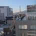 Apa Hotel Sagamihara Hashimoto Ekimae city view with distant mountains and rooftop buildings in Sagamihara