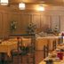 Hotel Pinzolo-Dolomiti dining room in Pinzolo with set tables and buffet spread