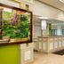 Hilton Garden Inn Hoffman Estates lobby with reception desk, bright seating area and modern neutral decor