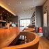 Hanting Nanshan Avenue Shenzhen lobby with long wooden table, bar seating and reception area