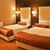 Rota Bulvar Hotel Ankara twin guest room with two single beds, bedside lights, and floor lamp