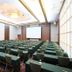Shin Osaka Esaka Tokyu Rei Hotel in Suita conference room with rows of meeting tables and chairs