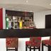 Ramada by Wyndham Wakefield bar area in Ossett with red floral stools and dark counter