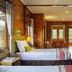 Jambuluwuk Convention Hall & Resort Puncak room with bed, windows, and balcony view in Tapos